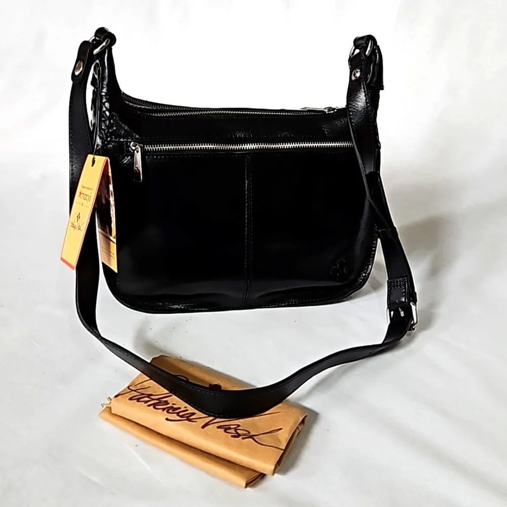 Patricia Nash vintage distressed leather Camila hobo shoulder bag.